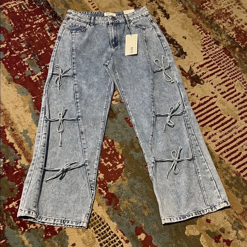 Trendy Women's Flare Jeans with Bow Details